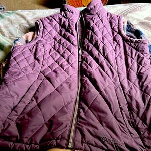 Vest it’s purple pink ish it’s a large